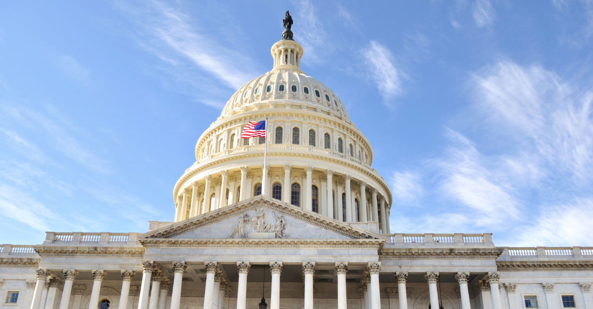Image of the U.S. Capitol against a blue sky.