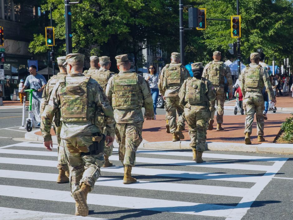 Image of federal troops in a city crosswalk.