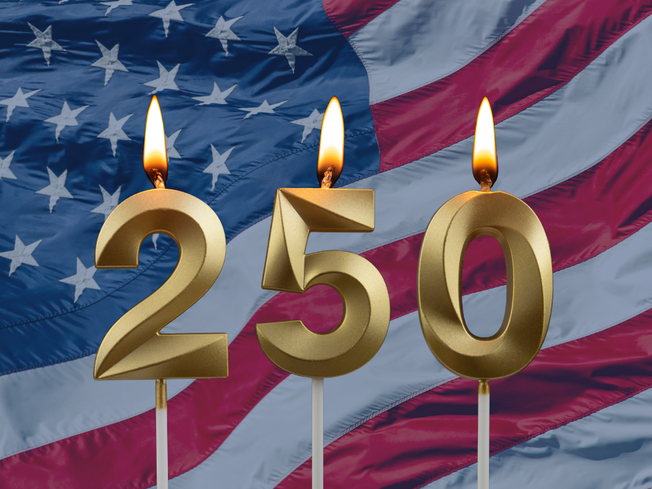 Image of birthday candles that read "250" in front of an American flag background.