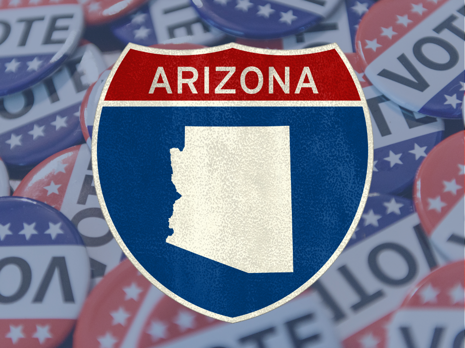Image of an Arizona insterstate highway sign with "VOTE" buttons in the background.