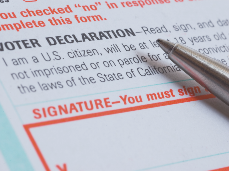 Image of a voter registration form with a yellow filter.