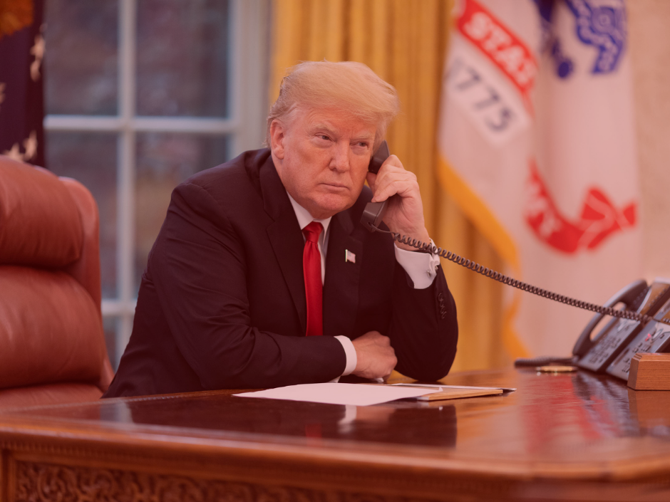 Image of Donald Trump talking on the phone.